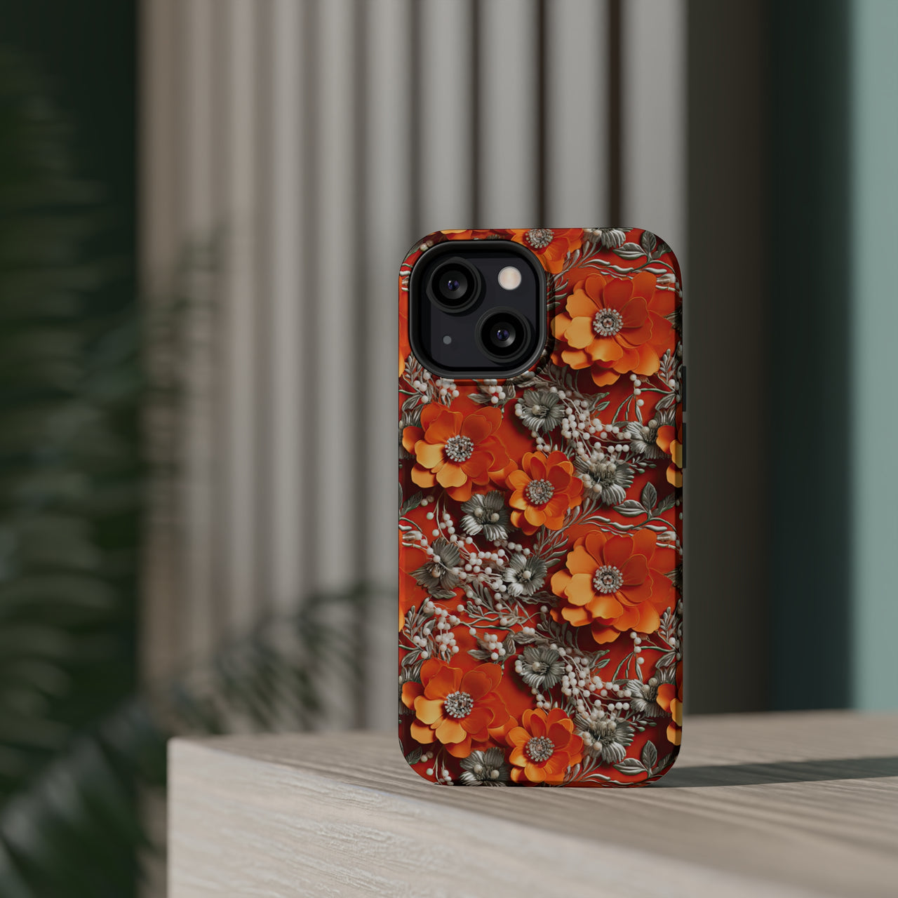 Orange Petals in Silver Tapestry MagSafe Tough Cases for iPhone 13, iPhone 13 Mini, iPhone 13 Pro, and iPhone 13 Pro Max.