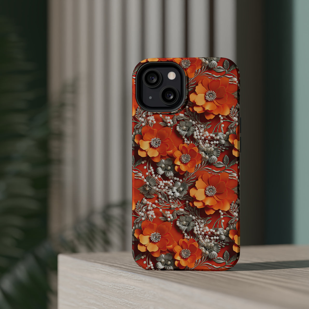 Orange Petals in Silver Tapestry MagSafe Tough Cases for iPhone 13, iPhone 13 Mini, iPhone 13 Pro, and iPhone 13 Pro Max.