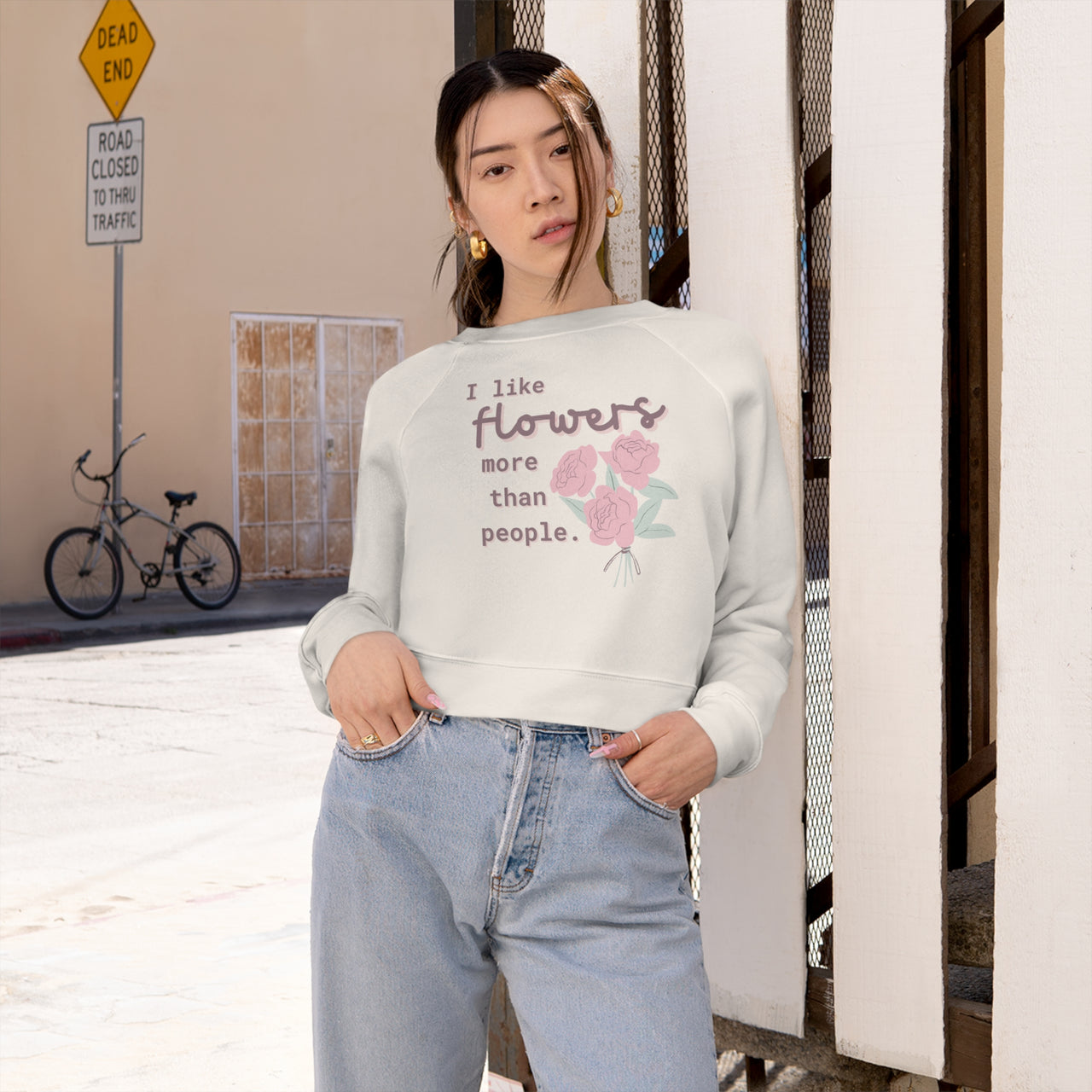 "I like flowers more than people." Women's Cropped Fleece Pullover