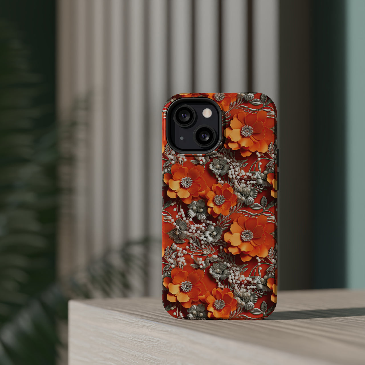 Orange Petals in Silver Tapestry MagSafe Tough Cases for iPhone 13, iPhone 13 Mini, iPhone 13 Pro, and iPhone 13 Pro Max.