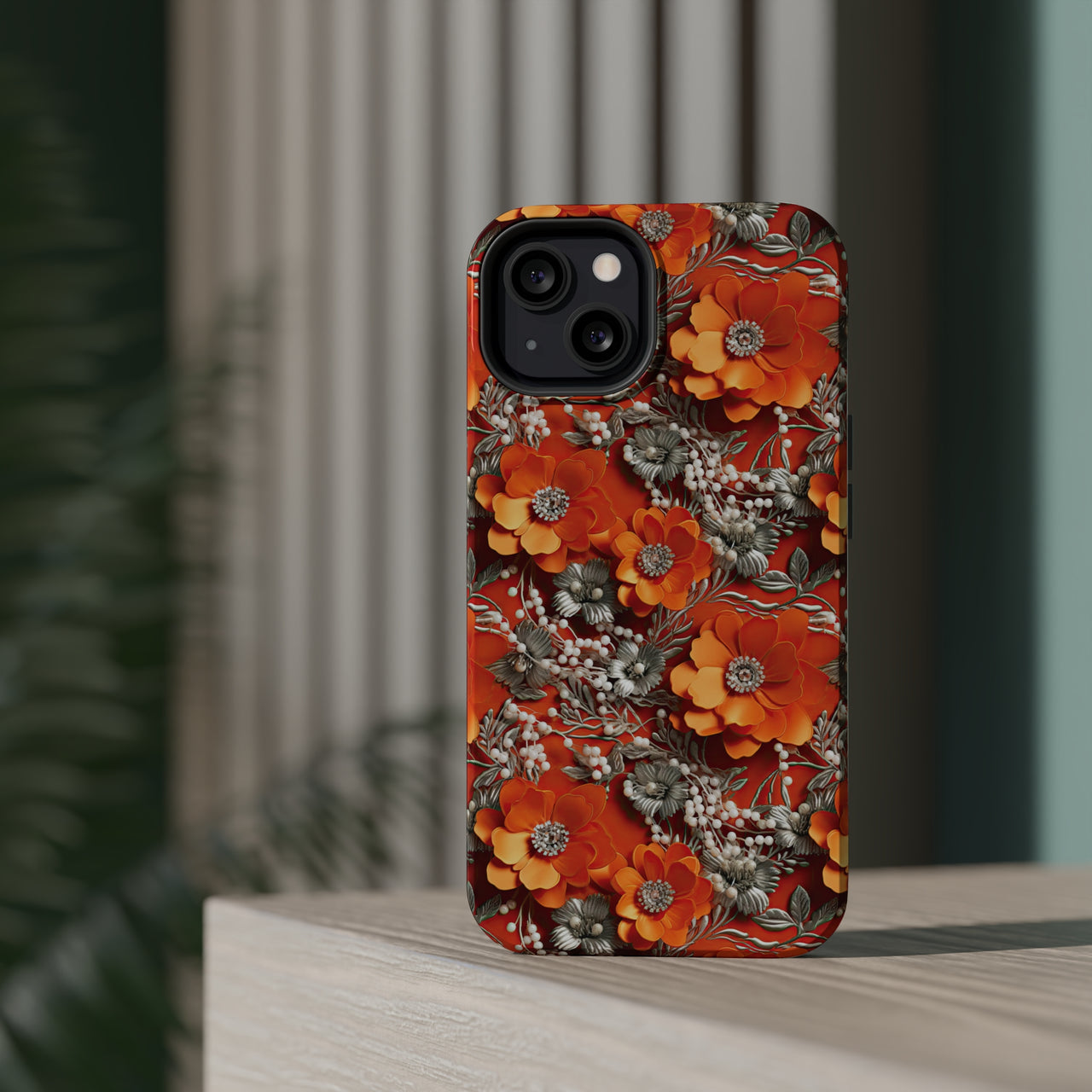 Orange Petals in Silver Tapestry MagSafe Tough Cases for iPhone 13, iPhone 13 Mini, iPhone 13 Pro, and iPhone 13 Pro Max.